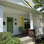 Apt A The Yellow Shuttered House