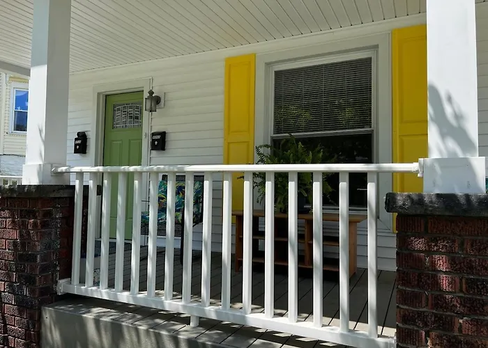 Apt A The Yellow Shuttered House
