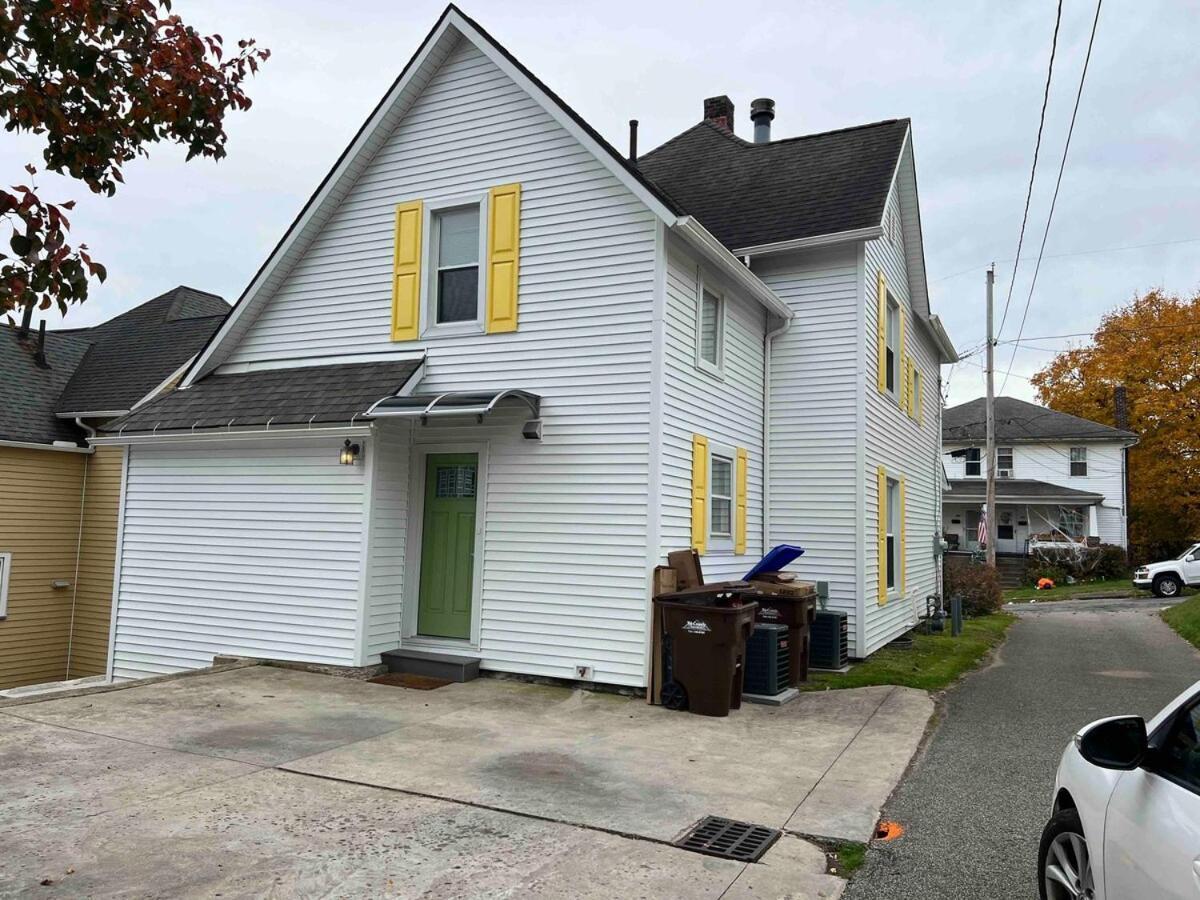 A The Yellow Shuttered House